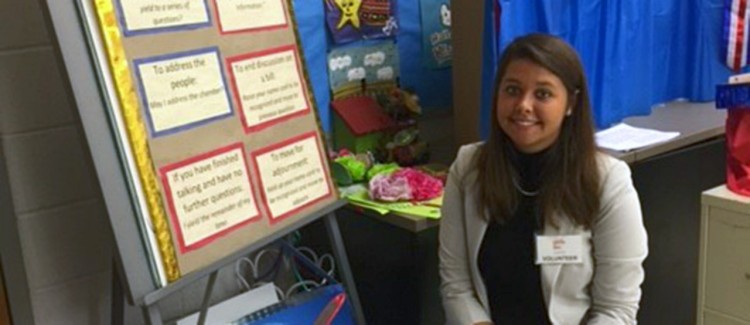 Lauren H. presents at her three-day summer citizenship camp.